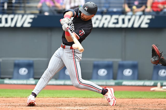 May 1, 2025; Cleveland, Ohio, USA; Minnesota Twins second baseman Edouard Julien (47) hits a single during the seventh inning against the Cleveland Guardians at Progressive Field. Mandatory Credit: Ken Blaze-Imagn Images/File Photo