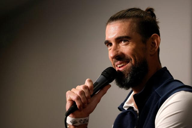 Olympic swimming great Michael Phelps has taken a jab at the performance of the US world championships team in Singapore on social media