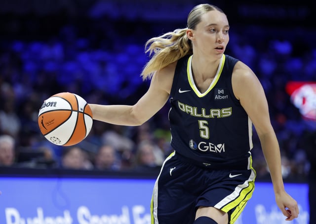 Paige Bueckers #5 of the Dallas Wings handles the ball during the first half against the Atlanta Dream at College Park Center on July 30, 2025 in Arlington, Texas. NOTE TO USER: User expressly acknowledges and agrees that, by downloading and/or using this photograph, user is consenting to the terms and conditions of the Getty Images License Agreement.