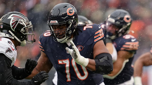Dec 31, 2023; Chicago, Illinois, USA; Chicago Bears offensive lineman Braxton Jones (70) blocks against the Atlanta Falcons at Soldier Field. Mandatory Credit: Jamie Sabau-USA TODAY Sports