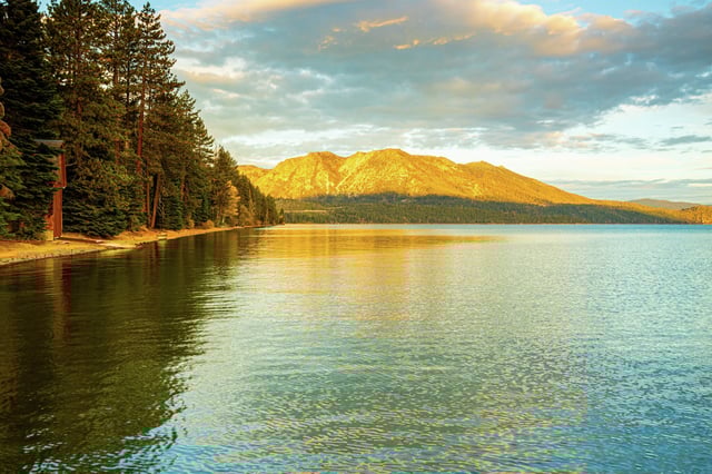 The beach at Camp Richardson on Lake Tahoe at sunrise in South Lake Tahoe, Calif.
