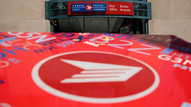 The exterior of a Canada Post office is shown in Toronto on Friday. Unionized workers at Canada Post have voted against the Crown corporation’s latest contract offer.