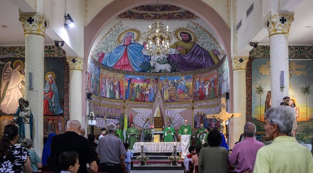 Worshippers attend a Sunday morning mass led by Cardinal Pierbattista Pizzaballa, Latin Patriarch of Jerusalem, at the Roman Catholic Church of the Holy Family in Gaza City on July 20, 2025. (Photo by Omar Al-Qattaa/AFP via Getty Images)