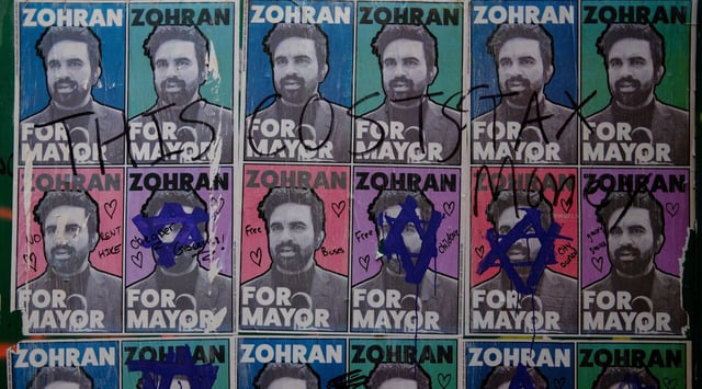 Graffiti, including Stars of David, is seen on posters of Zohran Mamdani, Democratic candidate for mayor of New York, on July 22, 2025 in New York. (Charly Triballeau/AFP via Getty Images)