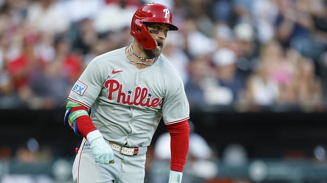 Jul 28, 2025; Chicago, Illinois, USA; Philadelphia Phillies first baseman Bryce Harper (3) runs after hitting a two-run double against the Chicago White Sox during the third inning at Rate Field. Mandatory Credit: Kamil Krzaczynski-Imagn Images