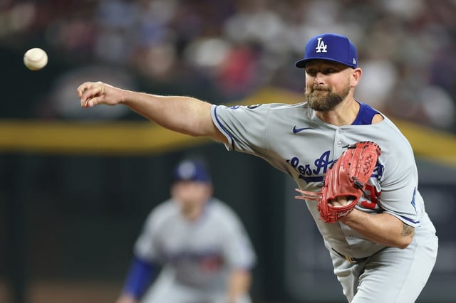Dodgers relief pitcher Kirby Yates was placed on the injured list on Friday, officially with lower back pain. But Dodgers manager Dave Roberts described Yates’ issue as something “we’re trying to figure out.” Yates returned to Los Angeles to be examined. (Photo by Christian Petersen/Getty Images)