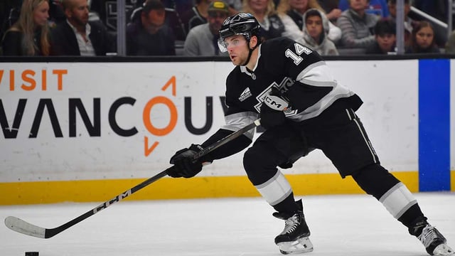 Apr 10, 2025; Los Angeles, California, USA; Los Angeles Kings right wing Alex Laferriere (14) moves in for a shot against the Anaheim Ducks during the second period at Crypto.com Arena. Mandatory Credit: Gary A. Vasquez-Imagn Images