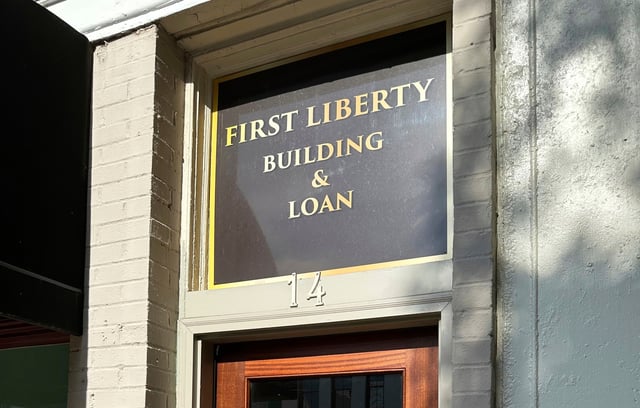 The office of First Liberty Building and Loan, which federal officials allege was a Ponzi scheme, is shown on Thursday, July 10, 2025 in Newnan, Ga. (AP Photo/Jeff Amy)