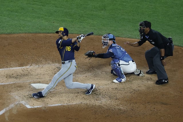 Aug 1, 2025; Washington, District of Columbia, USA; Milwaukee Brewers outfielder Blake Perkins (16) hits a two run home run against the Washington Nationals during the fifth inning at Nationals Park. Mandatory Credit: Geoff Burke-Imagn Images