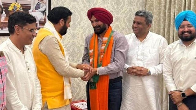 Haryana chief minister Nayab Singh Saini inducting Ranjit Singh Gill into the BJP in Chandigarh on Friday night. (X)