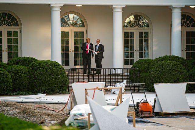 President Donald Trump, left, and James Blair, White House deputy chief of staff for legislative, political and public affairs, view renovations to the Rose Garden of the White House in Washington, DC, on Tuesday, July 15.