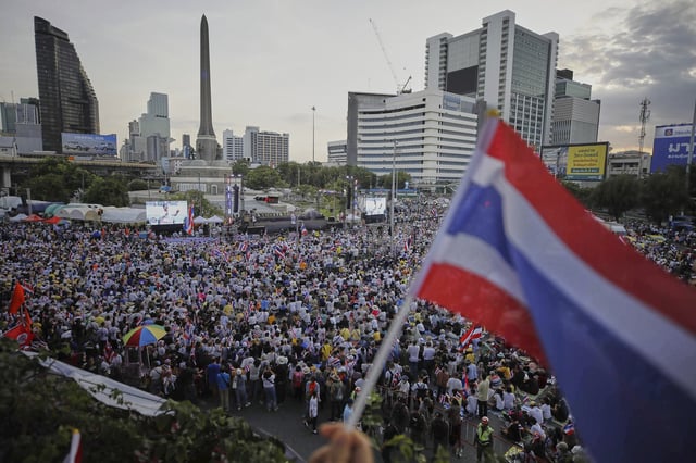 Protesters waving Thailand flags gather at Victory Monument demanding Prime Minister Paetongtarn Shinawatra resign in Bangkok, Thailand, Saturday, Aug. 2, 2025. (AP Photo/Tadchakorn Kitchaiphon)