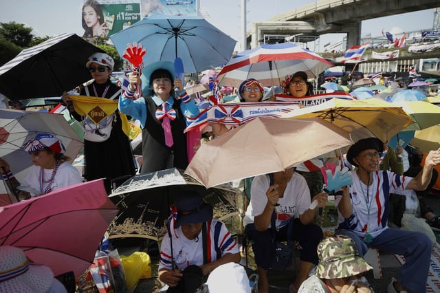 Protesters gather at Victory Monument demanding Thailand's Prime Minister Paetongtarn Shinawatra resign in Bangkok, Thailand, Saturday, Saturday, Aug. 2, 2025. (AP Photo/Tadchakorn Kitchaiphon)