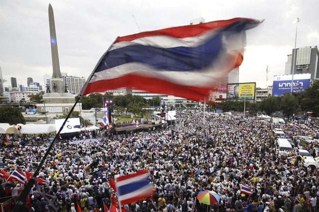 Protesters waving Thailand flags gather at Victory Monument demanding Prime Minister Paetongtarn Shinawatra resign in Bangkok, Thailand, Saturday, Aug. 2, 2025. (AP Photo/Tadchakorn Kitchaiphon)