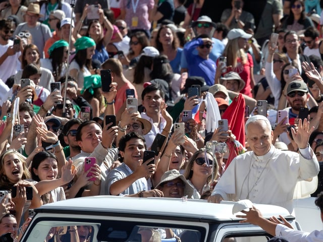 VATICAN CITY, VATICAN - 2025/07/30: Pope Leo XIV greets the faithful in the Jubilee of Youth as he arrives to conduct his weekly general audience in St Peter's Square at the Vatican. (Photo by Maria Grazia Picciarella/SOPA Images/LightRocket via Getty Images)