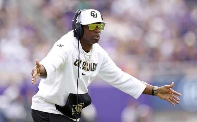 Head coach Deion Sanders of the Colorado Buffaloes celebrates a touchdown against the TCU Horned Frogs during the first half at Amon G. Carter Stadium on September 2, 2023 in Fort Worth, Texas.