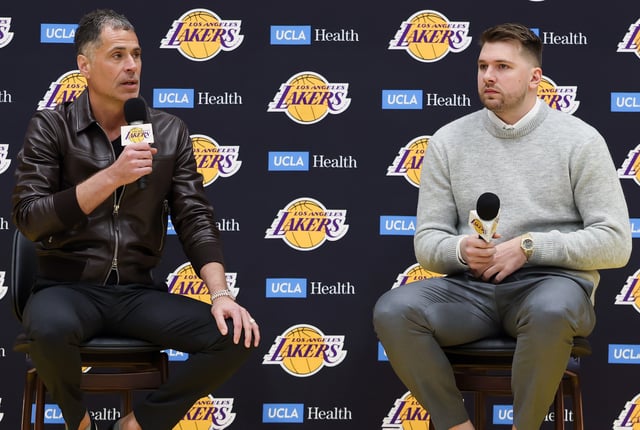 Luka Doncic, formerly of the Dallas Mavericks and new member of the Los Angeles Lakers, looks on as Rob Pelinka, Los Angeles Lakers general manager, speaks at a press conference at UCLA Health Training Center on February 04, 2025 in El Segundo, California.