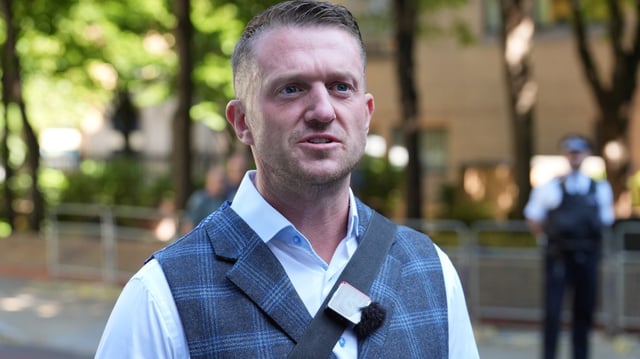 Police want to speak to Tommy Robinson, who left the country on Tuesday