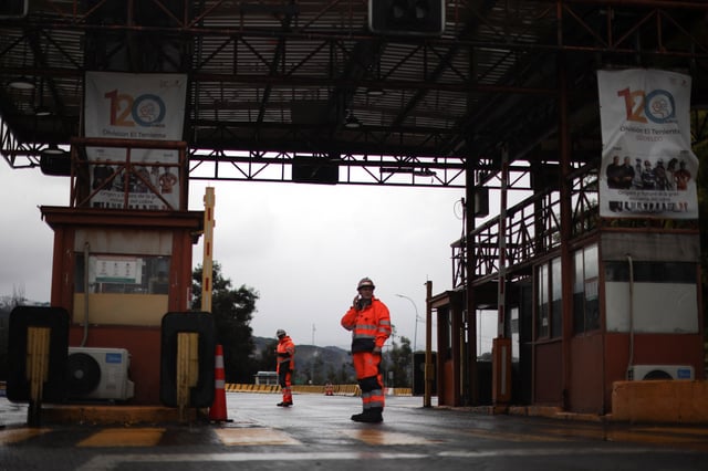 Codelco's security personnel block the access to the El Teniente copper mine complex after several miners have been reported missing at the Andesita unit following a seismic incident, in Maitenes, Chile, August 1, 2025. REUTERS/Pablo Sanhueza
