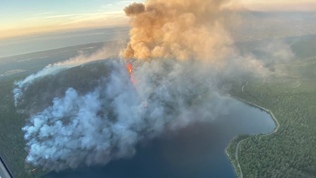 The Wesley Ridge wildfire on the north shore of Cameron Lake on Vancouver Island prompted evacuation orders to be expanded late Friday night northwest of Nanaimo.
