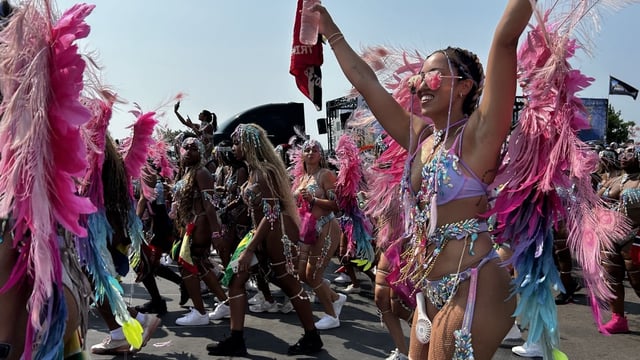 Thousands of people decked out in an array of colourful, elaborate ensembles made their way down Lake Shore Boulevard Saturday for the Toronto Caribbean Carnival's annual Grand Parade, one of the largest events in the city. 