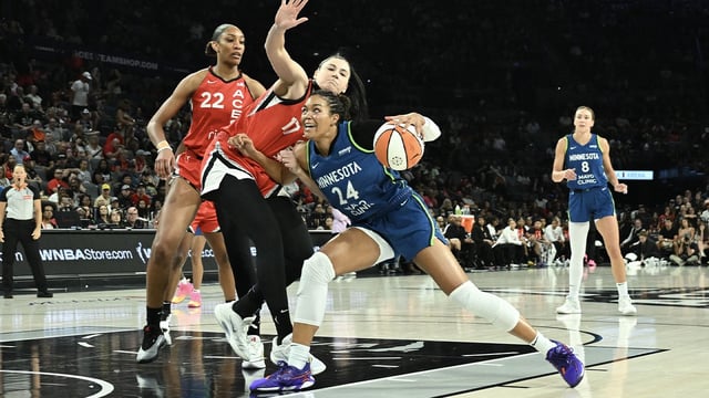 Aug 2, 2025; Las Vegas, Nevada, USA; Minnesota Lynx forward Napheesa Collier (24) drives against Las Vegas Aces center Megan Gustafson (17) during the first quarter of their game at Michelob Ultra Arena. Mandatory Credit: Candice Ward-Imagn Images

8/2/25