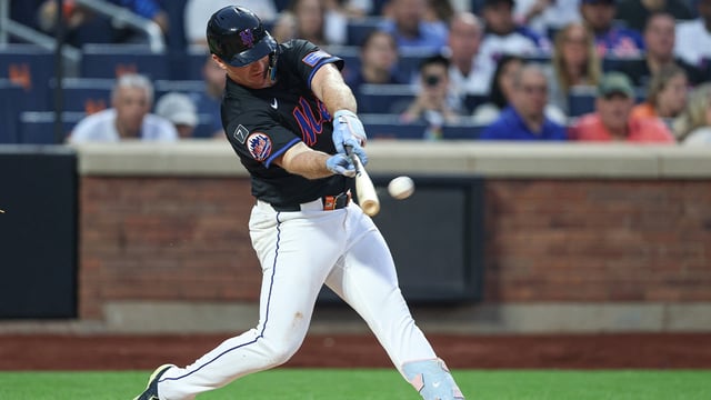 Jun 13, 2025; New York City, New York, USA; New York Mets first baseman Pete Alonso (20) doubles during the fourth inning against the Tampa Bay Rays at Citi Field. Mandatory Credit: Vincent Carchietta-Imagn Images