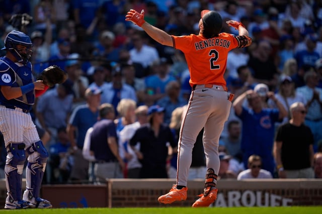 The Orioles&#39; Gunnar Henderson runs the bases after hitting a three-run home run during the eighth inning against the Cubs on Saturday, Aug. 2, 2025, at Wrigley Field. (AP Photo/Erin Hooley)