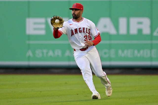 Jul 24, 2025; Anaheim, California, USA;  Los Angeles Angels first baseman LaMonte Wade Jr. (35) makes a play against the Seattle Mariners at Angel Stadium. Mandatory Credit: Jayne Kamin-Oncea-Imagn Images/File Photo