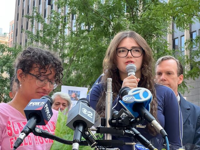 Yeonsoo Go’s high school friends Gabriela Lopez, 19, left, and Caitlin Highins, 18, speak to the media at rally at Federal Plaza calling for Soo’s release. (Emma Seiwell for New York Daily News)