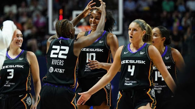 Aug 1, 2025; Uncasville, Connecticut, USA; Connecticut Sun guard Saniya Rivers (22) reacts after a three point basket by center Olivia Nelson-Ododa (10) in the second half at Mohegan Sun Arena. Mandatory Credit: David Butler II-Imagn Images