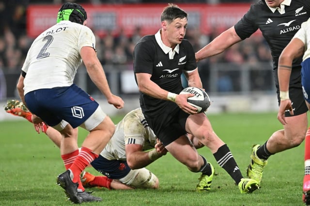 New Zealand's Cameron Roigard (with ball) in action against France in early July. He has been put on the injury list after suffering a stress fracture