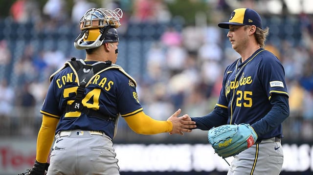 Aug 2, 2025; Washington, District of Columbia, USA; Milwaukee Brewers relief pitcher Nick Mears celebrates defeating the Washington Nationals with catcher William Contreras (24) during the ninth inning at Nationals Park. Mandatory Credit: Rafael Suanes-Imagn Images