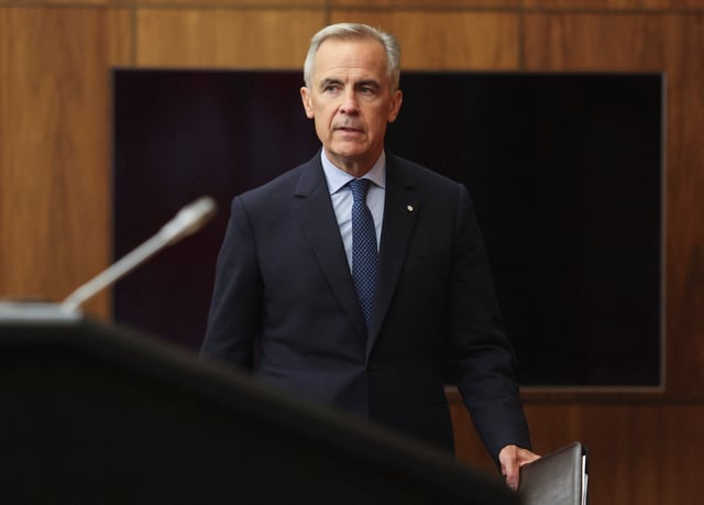 Canada's Prime Minister Mark Carney arrives at a press conference to make an announcement on recognizing Palestinian statehood, in Ottawa, Ontario, Canada, July 30, 2025.  REUTERS/Patrick Doyle/File Photo