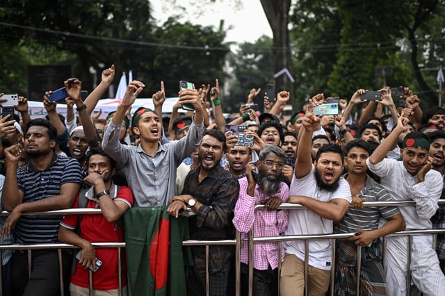 Supporters of National Citizen Party (NCP) shout slogans during a political rally in Dhaka, Bangladesh, Sunday, Aug. 3, 2025. (AP Photo/Mahmud Hossain Opu)