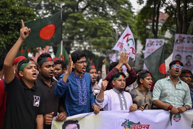 Supporters of National Citizen Party (NCP) shout slogans during a political rally in Dhaka, Bangladesh, Sunday, Aug. 3, 2025. (AP Photo/Mahmud Hossain Opu)
