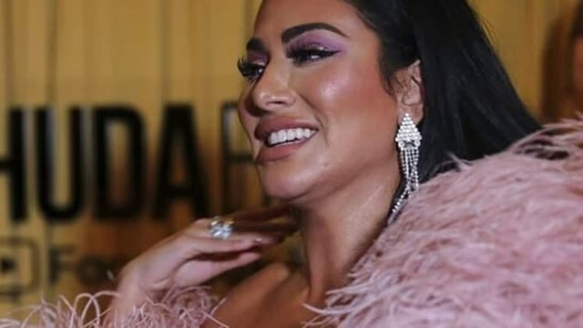 Huda Kattan's controversial TikTok video alleging Israel's involvement in historical atrocities was removed for violating community guidelines. 