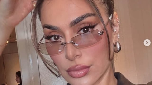  TikTok removed Huda Kattan's video for violating community guidelines.
