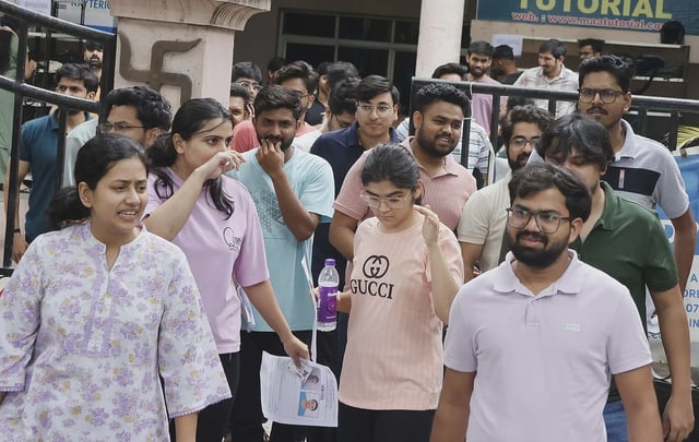 Candidates began arriving at the centres nearly an hour before the exam undergoing a rigorous three-stage verification process