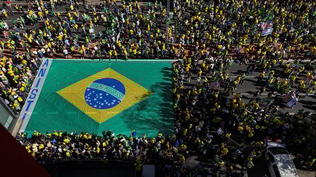 A drone view shows supporters of former Brazilian President Jair Bolsonaro taking part in a demonstration against the Supreme Court's measures in his trial, in Sao Paulo, Brazil August 3, 2025. REUTERS/Jorge Silva