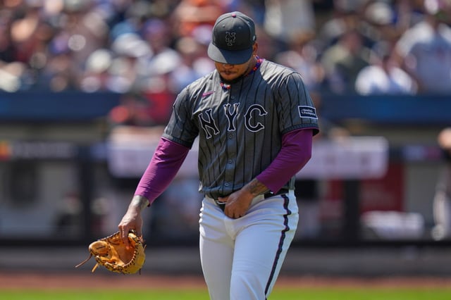 New York Mets pitcher Frankie Montas returns to the dugout during the fourth inning of a baseball game against the San Francisco Giants, Sunday, Aug. 3, 2025, in New York. (AP Photo/Seth Wenig)