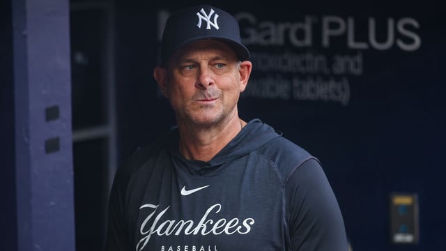 Jul 19, 2025; Atlanta, Georgia, USA; New York Yankees manager Aaron Boone (17) in the dugout before a game against the Atlanta Braves at Truist Park. Mandatory Credit: Brett Davis-Imagn Images
