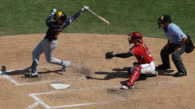 Aug 3, 2025; Washington, District of Columbia, USA; Milwaukee Brewers second baseman Brice Turang (2) hits a two run home run against the Washington Nationals during the seventh inning at Nationals Park. Mandatory Credit: Geoff Burke-Imagn Images