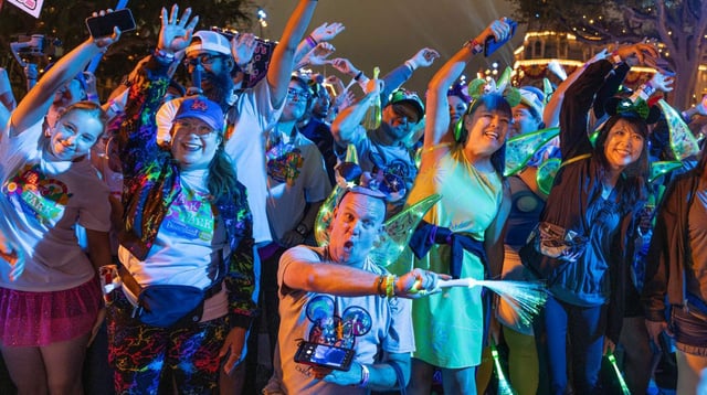 Thousands of pre-dawn walkers, including Daniel Bowen, center, stretch at the starting line of CHOC’s annual 5k Walk in the Park in Anaheim on Sunday, Aug. 3, 2025. The event hosted more than 6,500 participants and raised over $2.3 million for children’s health. (Photo by Mindy Schauer, Orange County Register/SCNG)