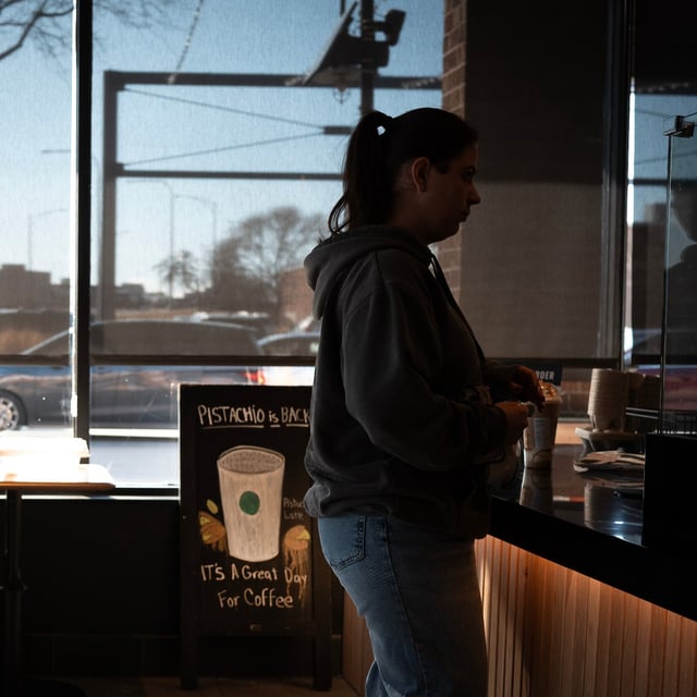 Customers at a Starbucks in Chicago in February.