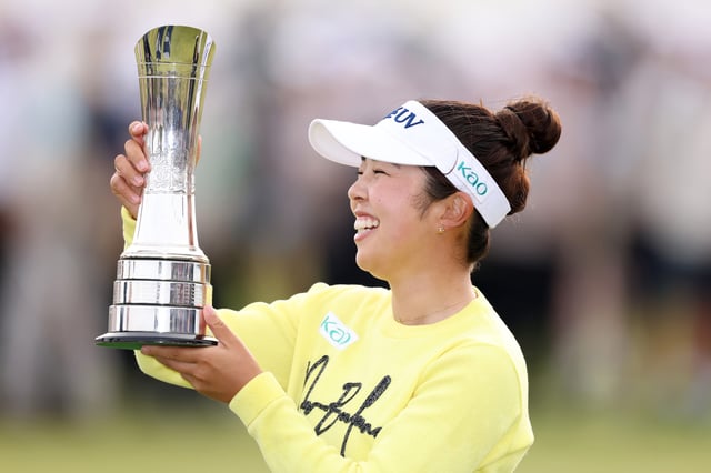 Miyu Yamashita of Japan poses for a photo with the trophy following the final round of the AIG Women&#39;s Open 2025 at Royal Porthcawl Golf Club on August 03, 2025 in Bridgend, Wales.