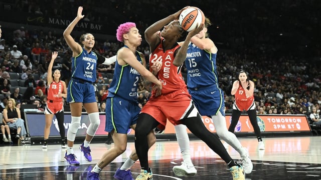 Aug 2, 2025; Las Vegas, Nevada, USA; Las Vegas Aces guard Jewell Loyd (24) collides with Minnesota Lynx guard Natisha Hiedeman (2) during the third quarter of their game at Michelob Ultra Arena. Mandatory Credit: Candice Ward-Imagn Images