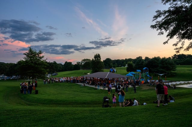Candles are lit during a candlelight vigil in memory of Mason Paul Kerns at Watkins Park in Mount Airy.(Thomas Walker/Freelance)