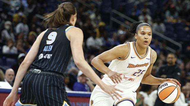 Aug 3, 2025; Chicago, Illinois, USA; Phoenix Mercury forward Alyssa Thomas (25) brings the ball up court against Chicago Sky guard Rebecca Allen (9) during the first half at Wintrust Arena. Mandatory Credit: Kamil Krzaczynski-Imagn Images