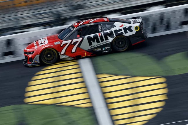 #77: Carson Hocevar, Spire Motorsports, MINER DOCKS, DOORS AND MORE. Chevrolet